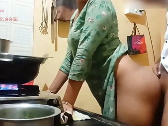 See this Indian Milf with a ample booty get down and sloppy in the kitchen