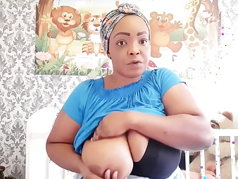 Step-mother Nigerian mummy demonstrates off how to milk her thick ebony bra-stuffers