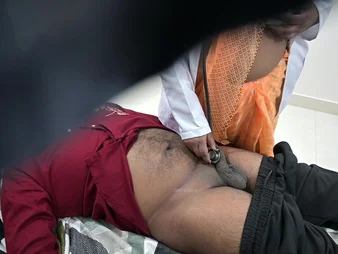 Indian take responsibility for examines patient's unearth in hospital dado with a naughty interlace