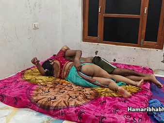 Devi, along to lush Indian MUMMY, gets rode wits her Desi husband's ample Desi fuckpole in a saree